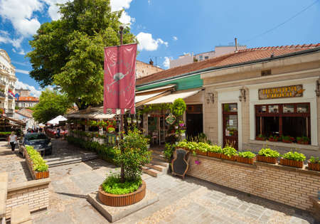 BELGRADE, SERBIA â JULY 07: Visitors enjoy cafes in Skadarlija, Belgrade's bohemian quarter on 07 July 2019 in Belgrade, Serbia.のeditorial素材