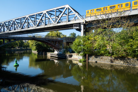 Subway train passes over the Landwehrkanal in Berlinの写真素材