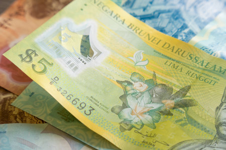 Examples of Brunei dollar notes, equivalent to Singapore dollarsの写真素材