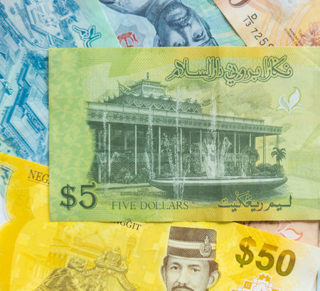 Examples of Brunei dollar notes, equivalent to Singapore dollarsの写真素材