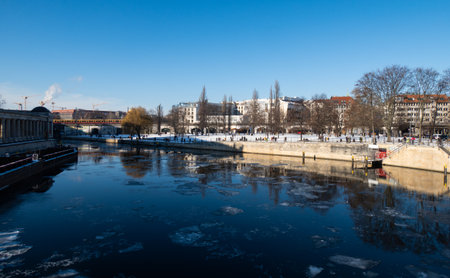 Berlin's River Spree in winter, with ice floating in the water.の写真素材