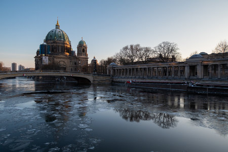 Berlin Cathedral and River Spree in winterの写真素材