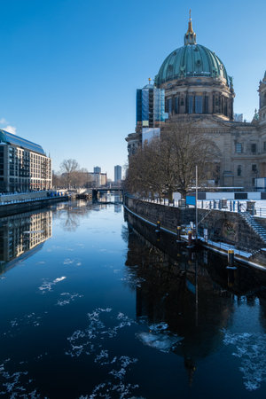 Berlin Cathedral and River Spree in winterの写真素材