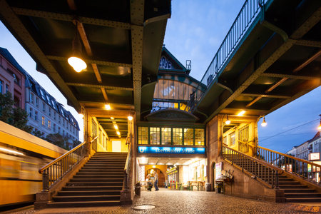 Traffic at Berlin's Eberswalder Strasse station at nightの写真素材