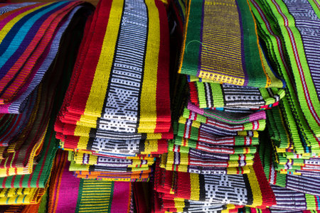Brightly colored woven cloth at Tais market, Diliの写真素材