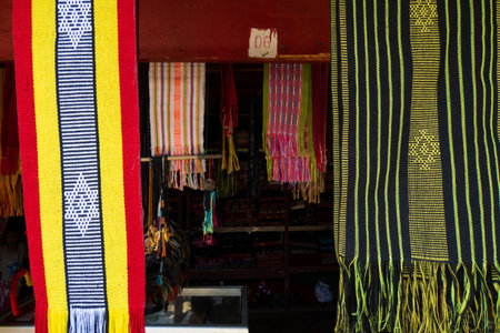 Brightly colored woven cloth at Tais market, Diliの写真素材