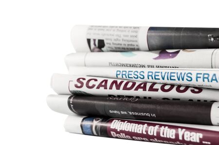 Newspapers with headlines on white background