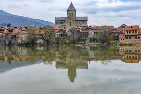 View of Svetitskhoveli cathedral over Mtkvari (Kura) river at early springtimeの写真素材