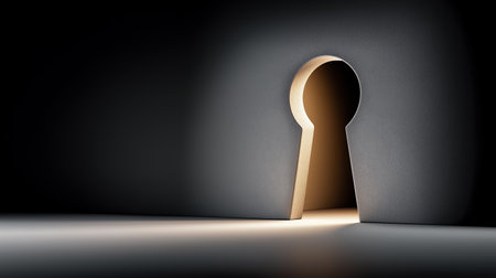 Keyhole in a dark wall with a beam of light conveys mystery and discovery concept useful for security access visuals and innovation storytelling in adsの素材