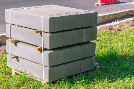 Sidewalk curb during road construction. Road repairs and installation of curbs in the city. Divider...