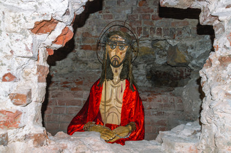 Religious reproduction in the wall of an ancient church. The image of Jesus Christ. Faith and religion.の写真素材