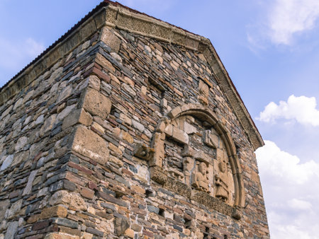 An ancient stone temple high in the mountains. Place of religious ceremonies. The old church on the...