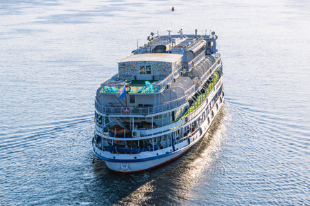 The ship is moving along the river. A deck for relaxing on a pleasure ship. Summer navigation on the river. Transportation of people by river transport. Rest on the river.の写真素材