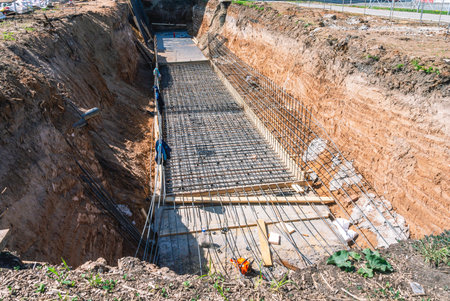 A large trench for laying urban communications for the improvement of people. Reinforcement for...
