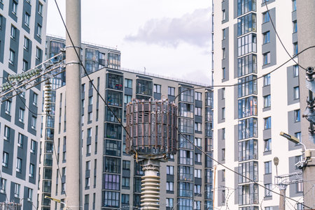 Glass insulators are installed on the power lines. Electrical substation for receiving, converting...