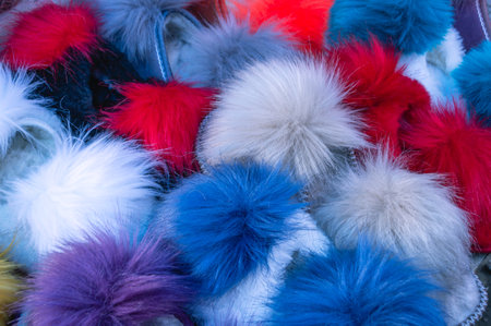 Children's warm slippers made of natural fur. Children's clothing made of natural materials. Colorful fur slippers.の写真素材