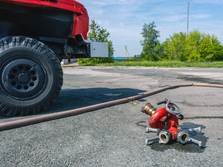 A fire barrel with high water consumption for extinguishing large fires. The fire barrel is next to...