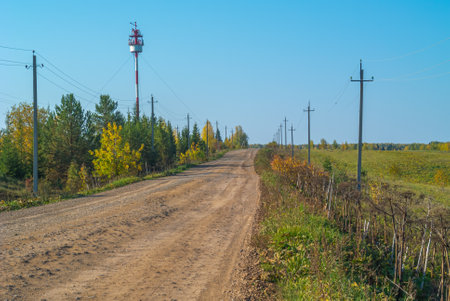In the distance, you can see a tower with antennas for cellular and Internet communications. Poles...
