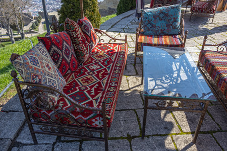 A place to relax in an oriental style with a view of the ancient city from above. Colorful tent for...