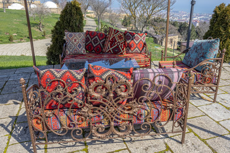 A place to relax in an oriental style with a view of the ancient city from above. Colorful tent for...