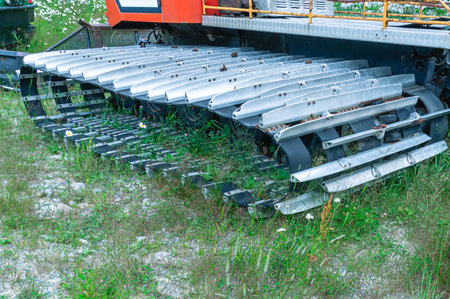 A tracked vehicle used for preparing ski trails. Snowcat for mountain rescue operations. A tractor...