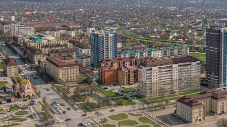 Aerial view of the city of Grozny in Chechnya. View of the city in the North Caucasus. Residential areas and the movement of cars through the streets of a big city.の写真素材