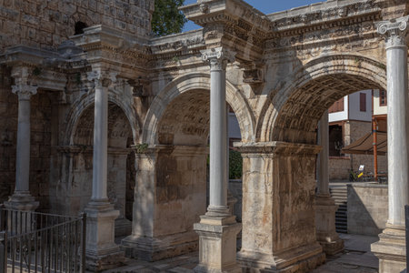 The Arch of ancient times. The famous gate, built in honor of the ancient Roman emperor. The Arc de Triomphe in the Kaleici area. Hadrian's Gate in Antalya. The arch is decorated with carved patterns.の写真素材