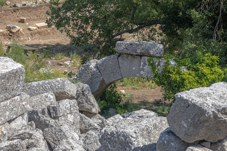 The ruins of the city of Termessos are located in Turkey high in the mountains. The remaining fragments of buildings in the ancient city are made of large smooth stone blocks.の写真素材