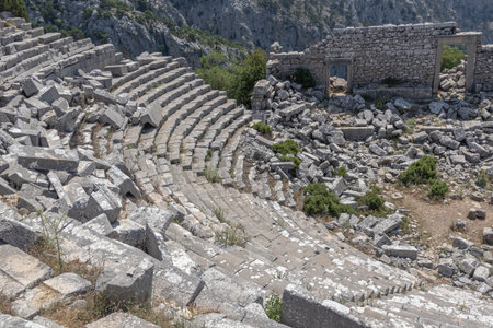 The amphitheater was built in the II century BC according to the classical Roman principle. Amphitheater in the ancient city of Termessos in Turkey. The amphitheater is high in the mountains.の写真素材