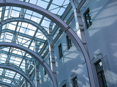 Glazing of the recreation area between the buildings for concerts and performances of artists. Steel...