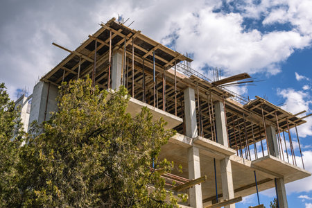 The frame of a building under construction. The structure of the building. Construction of...