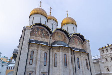 The cathedral with golden domes on the territory of the Moscow Kremlin. Temples of the Moscow Kremlin. The architectural ensemble of Cathedral Square. Culture and heritage in architecture.の写真素材
