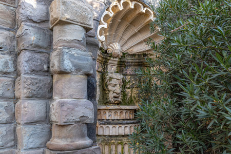 Mascaron is a wall fountain, which is a sculptural image of a character, a mythical creature. Water flows from the mouth of the sculpture.の写真素材