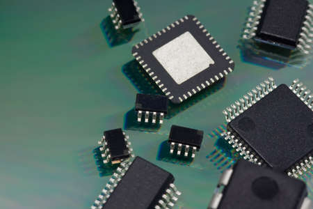 Technology Related: Assorted Integrated Circuits, can be found in every electronics equipment like, computers, radios, mp3, camera, automobile, space satellites, etc.の写真素材