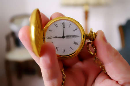 Pocketwatch in a handの写真素材