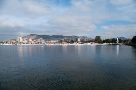 Kelowna waterfront with harbour with the sails