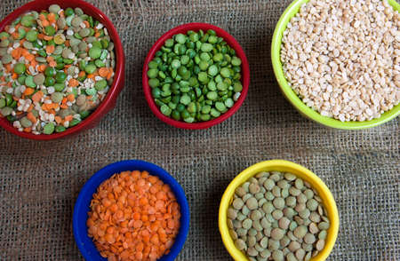 Split peas and lentils in bowls 2 large and 3 small