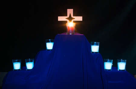 Candles for a Tenebrae service with 6 candles tsnuffed out.
