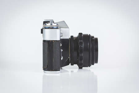 Retro camera isolated on white side viewの写真素材