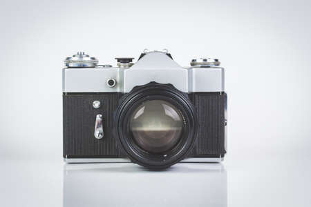 Retro camera isolated on white front viewの写真素材