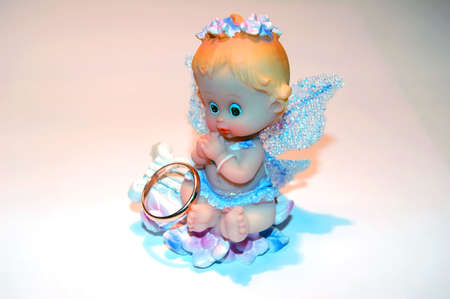 angel with wedding ringsの写真素材