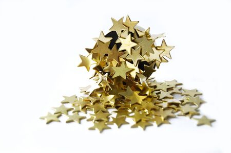 heap golden stars on background, macroの写真素材