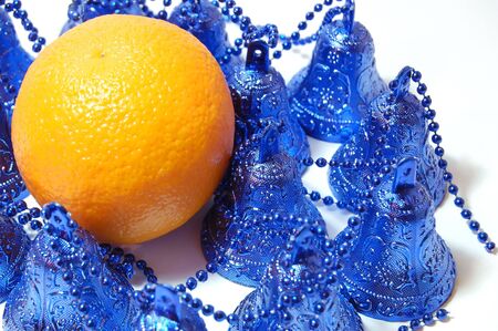 orange in encirclement bells on white backgroundの写真素材