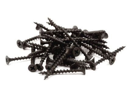 heap screws on the white backgroundの写真素材