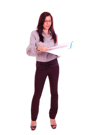 Young woman wearing in glasses standing with file of papers isolated on the white backgroundの写真素材