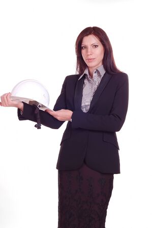 young attractive business woman showing white helmet on the white backgroundの写真素材