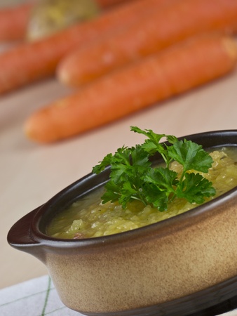 Stew with potatoes, turnips, carrots and bacon, garnished with parsleyの写真素材