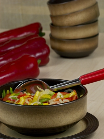 Pepper salad of yellow, red and green peppersの写真素材