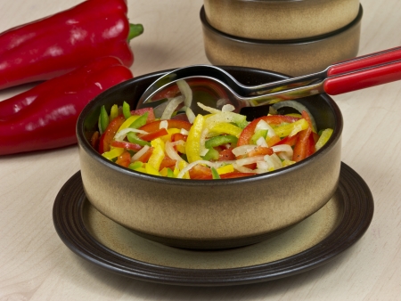 Pepper salad of yellow, red and green peppersの写真素材