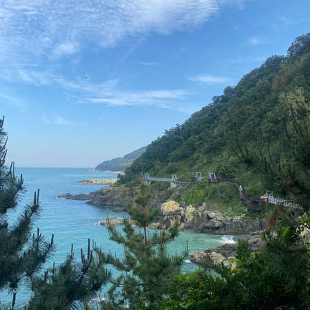 Beautiful view of the sea and mountains on a sunny day.の写真素材